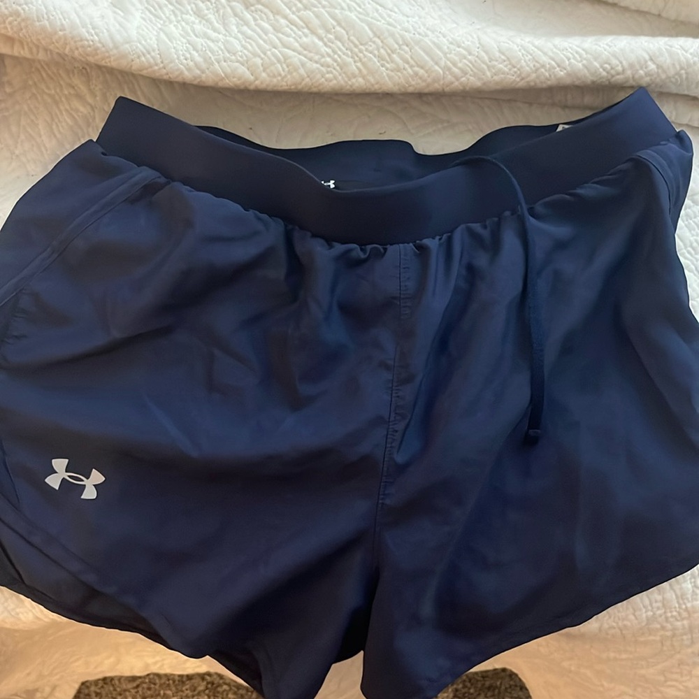 size medium Under Armor navy blue female shorts